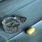 dental-amalgam-in-a-dappen-dish-and-triturated-amalgam-capsule